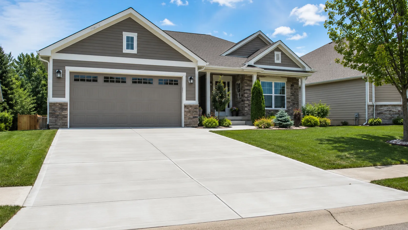 New concrete driveway at a residential home in Lee’s Summit