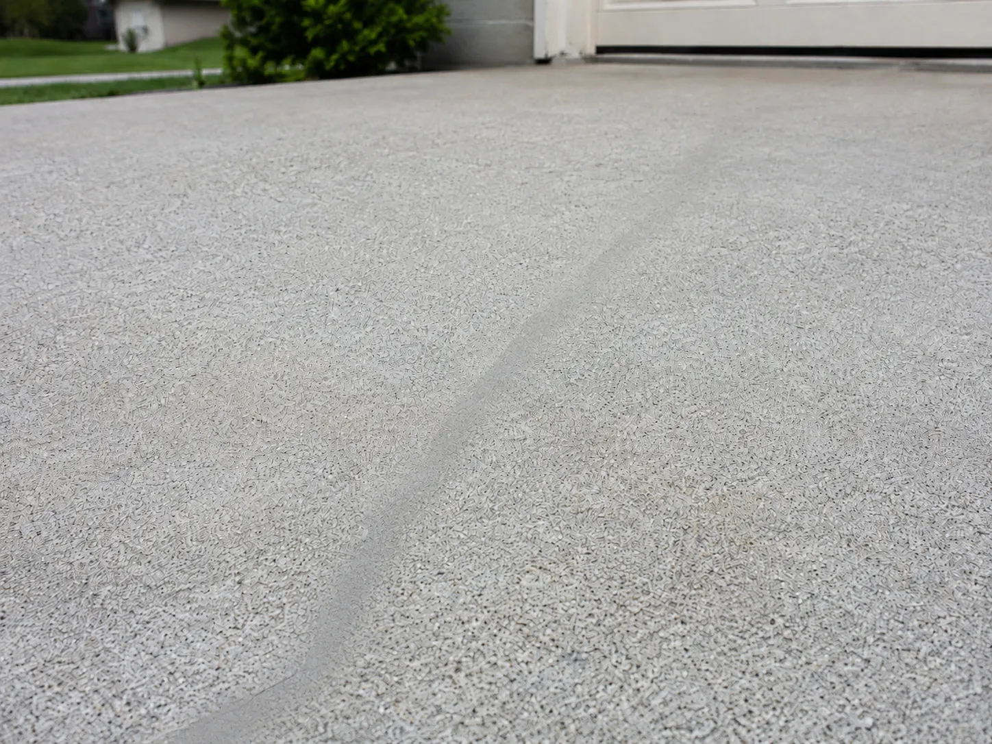Concrete slab with repaired crack lines
