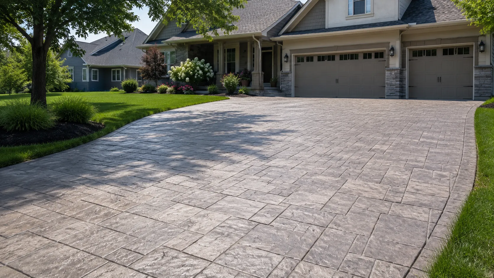 Stamped concrete driveway with a stone pattern