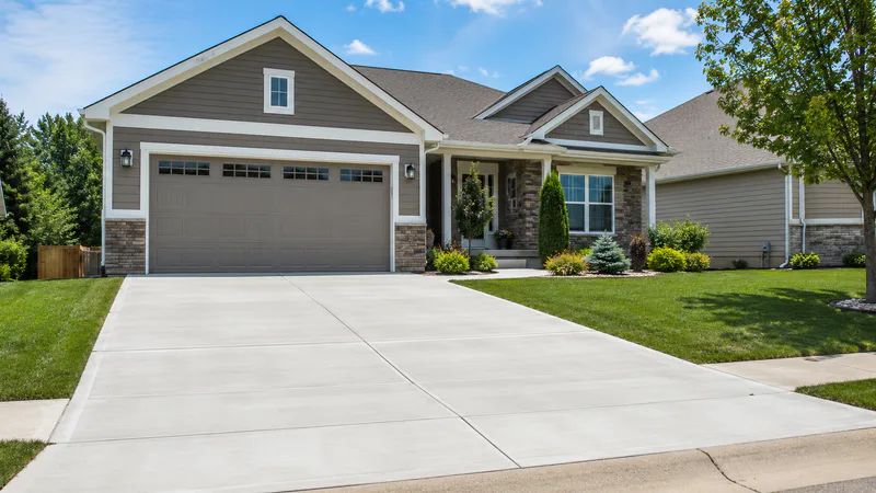New concrete driveway at a residential home in Lee’s Summit